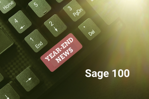 keyboard with words Sage 100 Year-End News