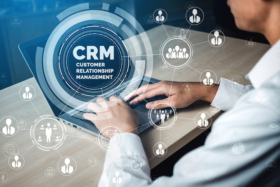 CRM Customer Relationship Management for business sales marketing system concept presented in futuristic graphic interface of service application to support CRM database analysis. Sage CRM training.