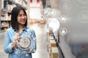 manager woman looking, picking, replenishment, receiving inventory at store warehouse in warehouse management system concept. Smart ERP for inventory management. ERP Retail Compliance